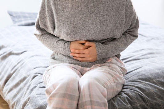 why swollen belly after menstruation