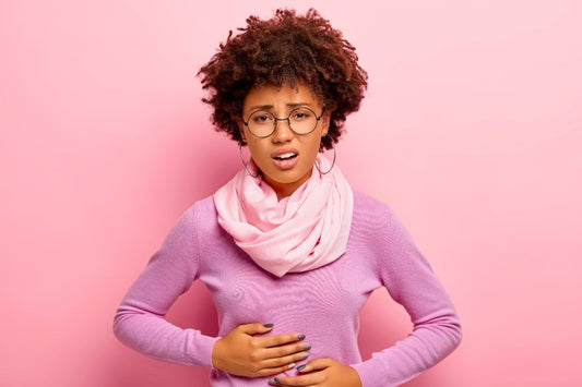 why swollen belly before menstruation
